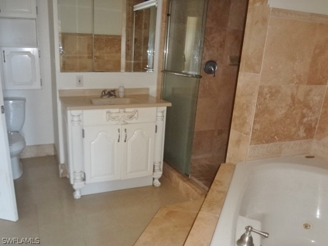 14071 Cemetery Road Fort Myers, FL 33905 - Photo 8 of 18 a bathroom with a granite countertop sink and a mirror