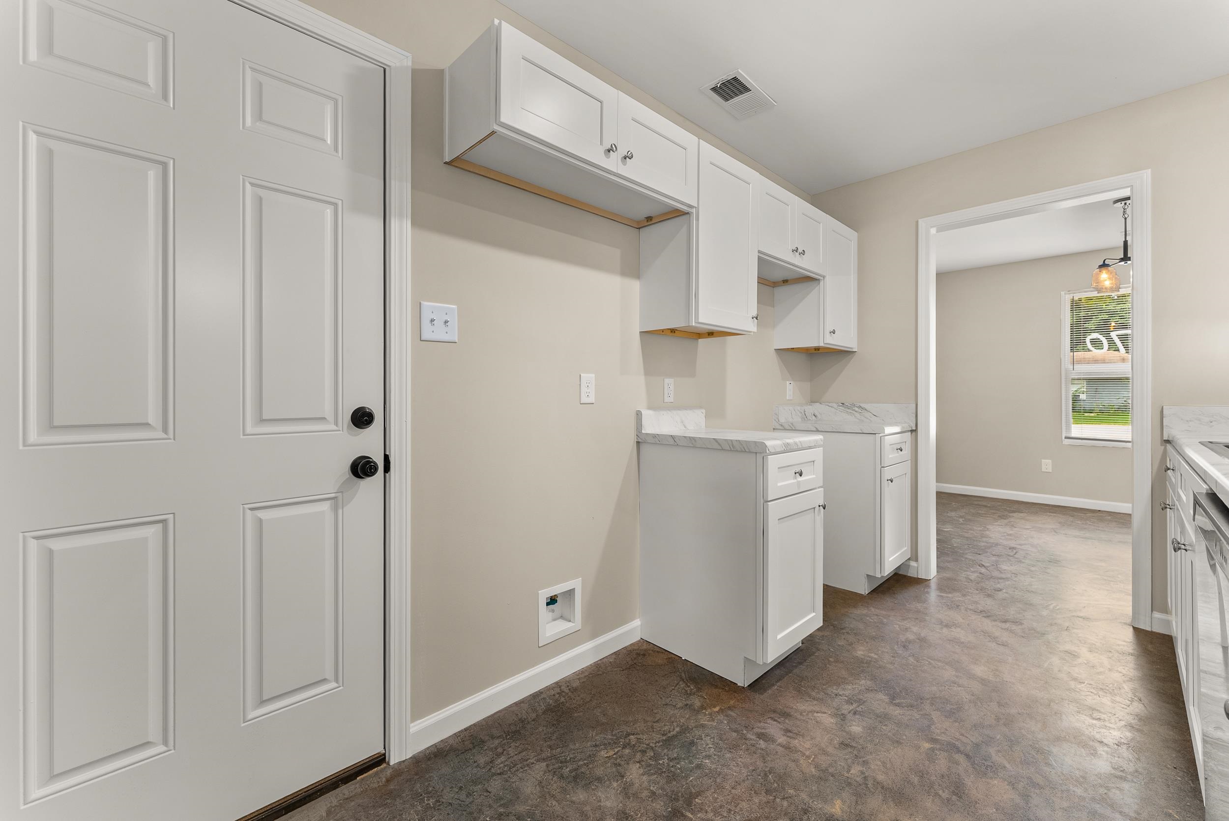 370 Watson Dr Extension Gallaway, TN 38002 - Photo 12 of 27 a view of a kitchen with white cabinets