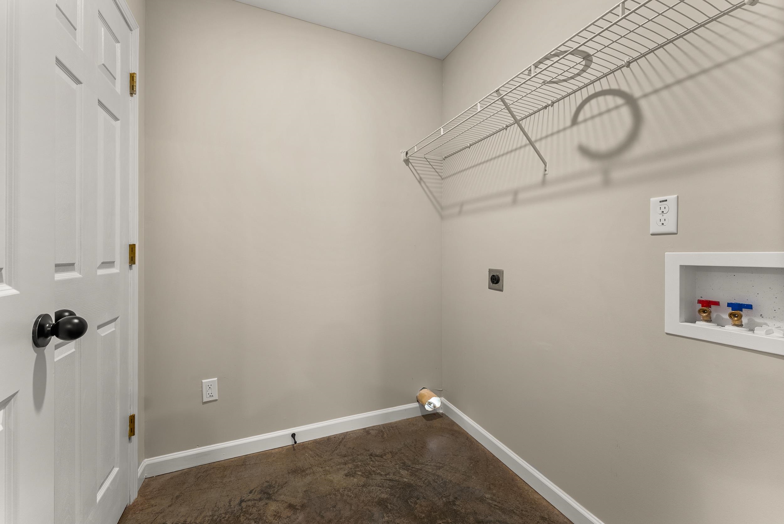 370 Watson Dr Extension Gallaway, TN 38002 - Photo 14 of 27 a view of a room with racks on the wall