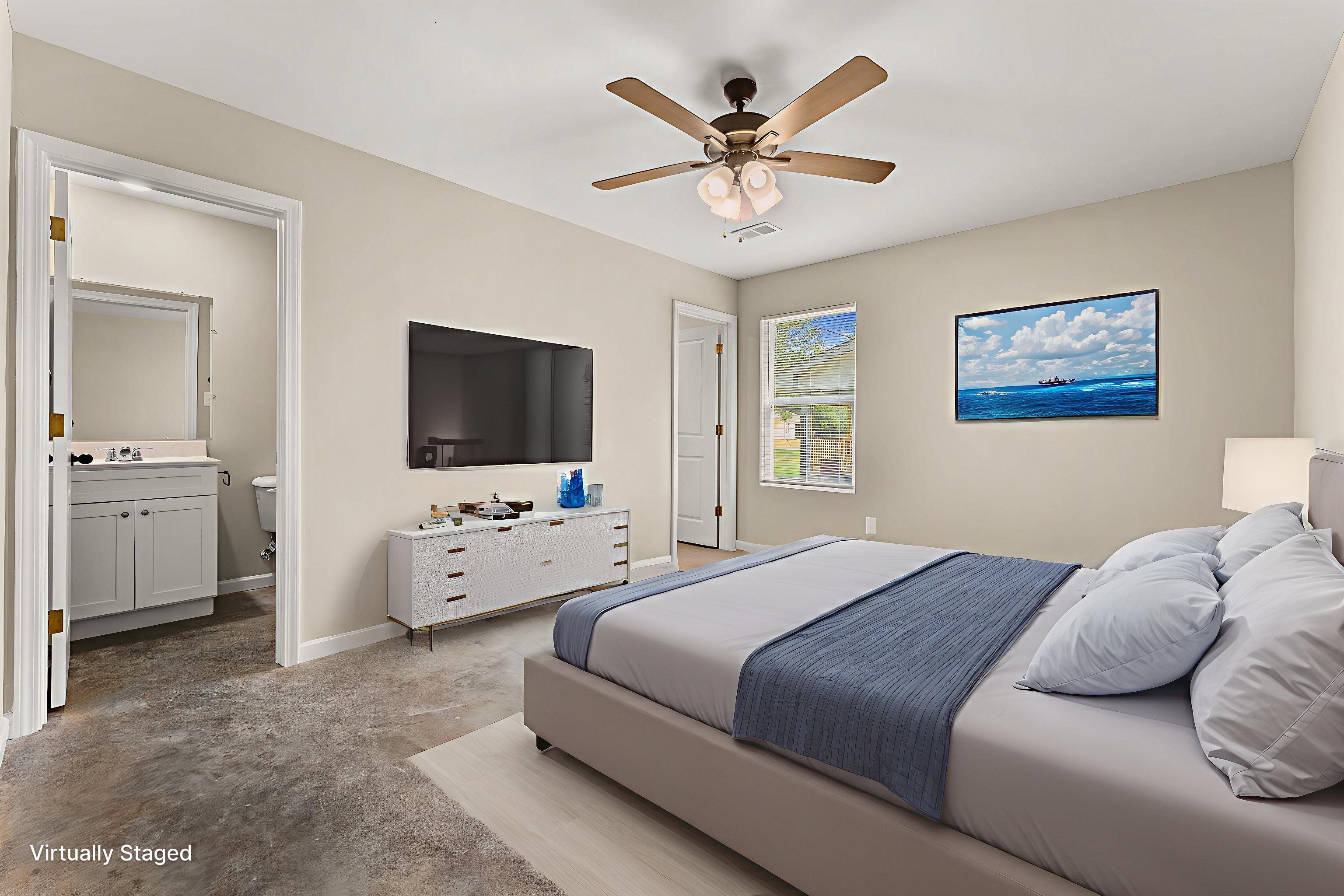 370 Watson Dr Extension Gallaway, TN 38002 - Photo 15 of 27 a bedroom with a bed and a flat screen tv