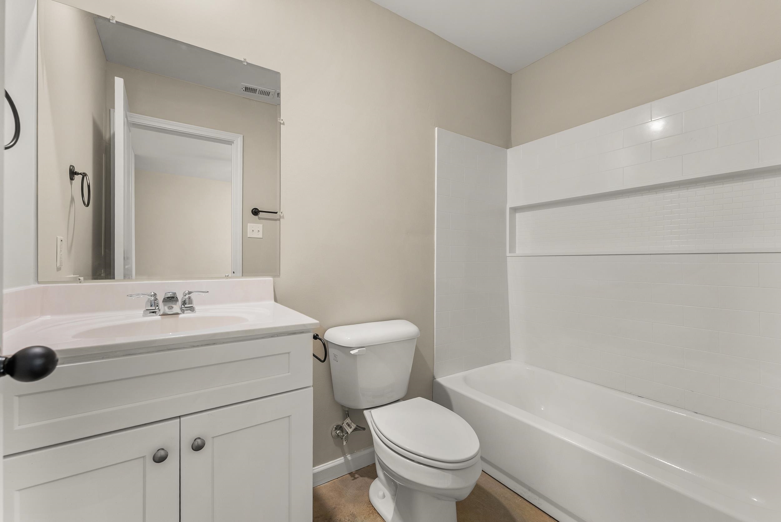 370 Watson Dr Extension Gallaway, TN 38002 - Photo 18 of 27 a bathroom with a sink a toilet and shower