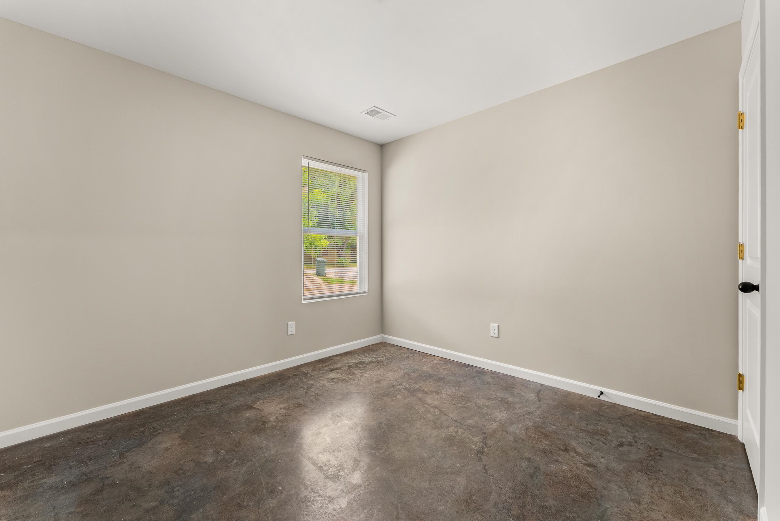 370 Watson Dr Extension Gallaway, TN 38002 - Photo 24 of 27 an empty room with windows and closet