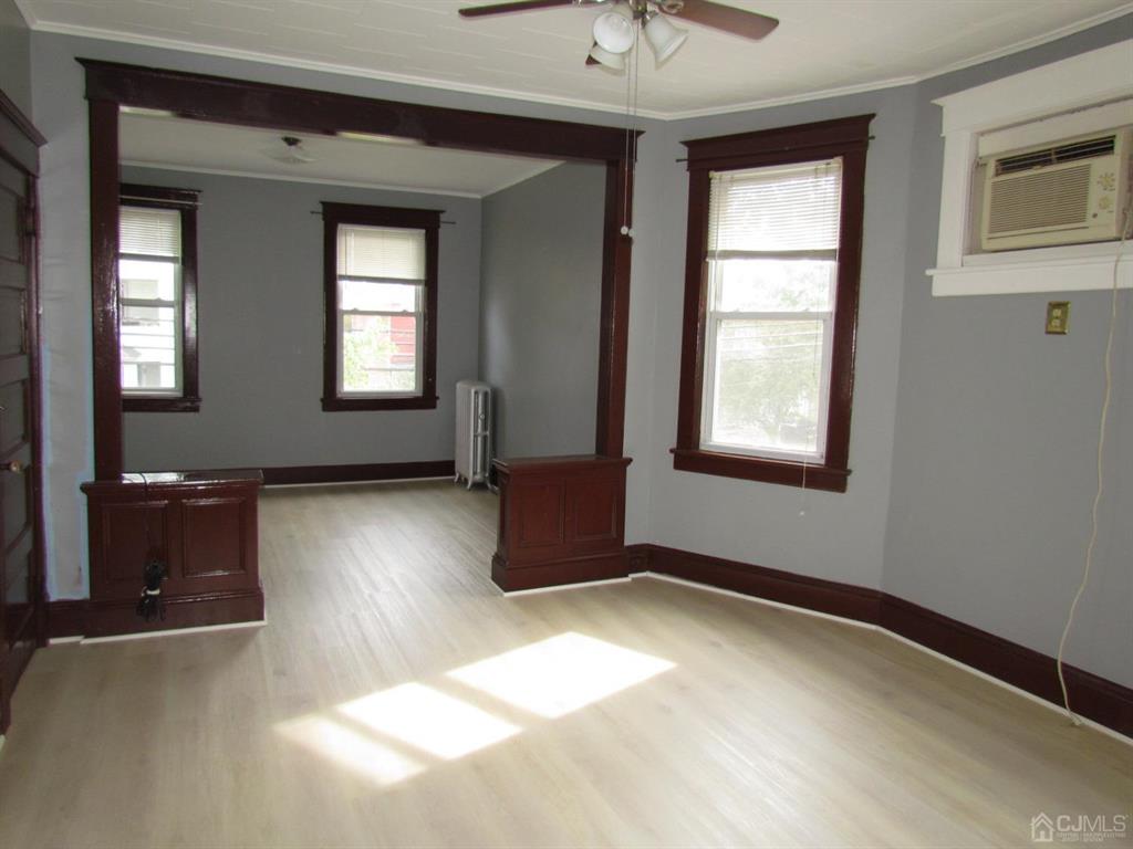 421 Magnolia Street, Unit 2 Highland Park, NJ 08904 - Photo 5 of 14 a view of livingroom with hardwood