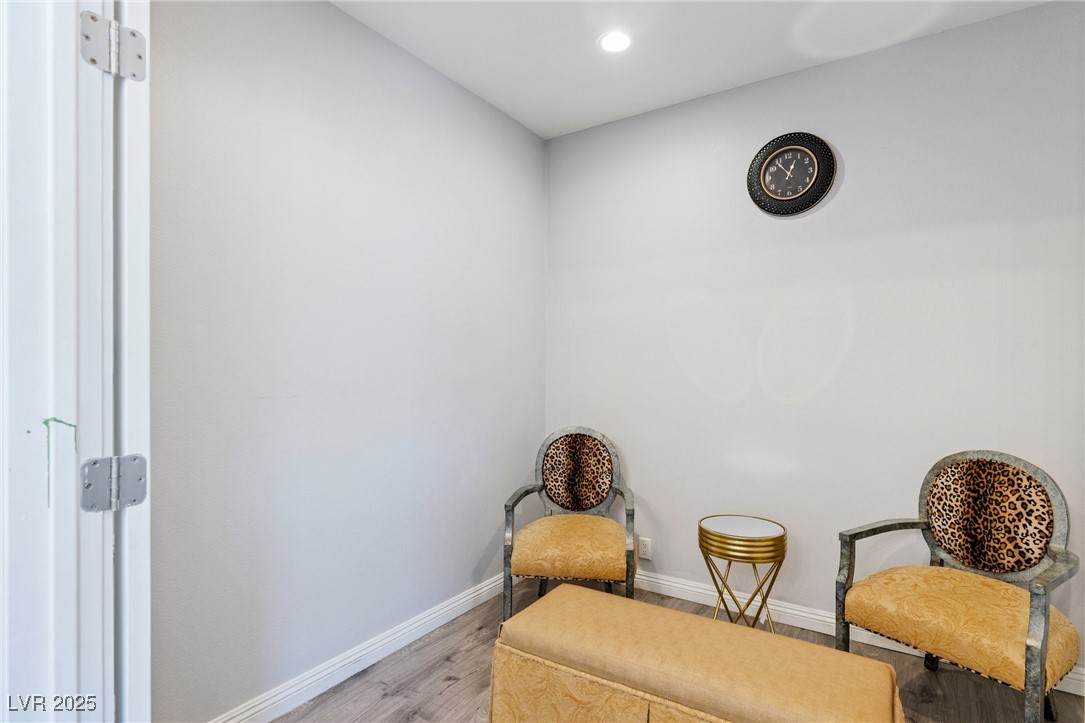 3 Chatmoss Road Henderson, NV 89052 - Photo 23 of 41 Living area featuring light wood-type flooring, baseboards, and recessed lighting