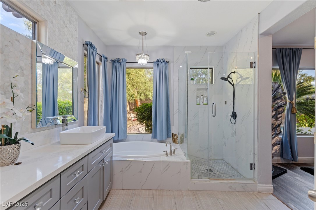 3 Chatmoss Road Henderson, NV 89052 - Photo 31 of 41 Full bath featuring a marble finish shower, a garden tub, and vanity
