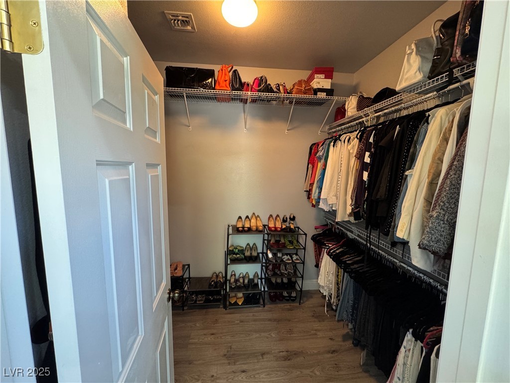 3 Chatmoss Road Henderson, NV 89052 - Photo 33 of 41 Spacious closet with wood finished floors