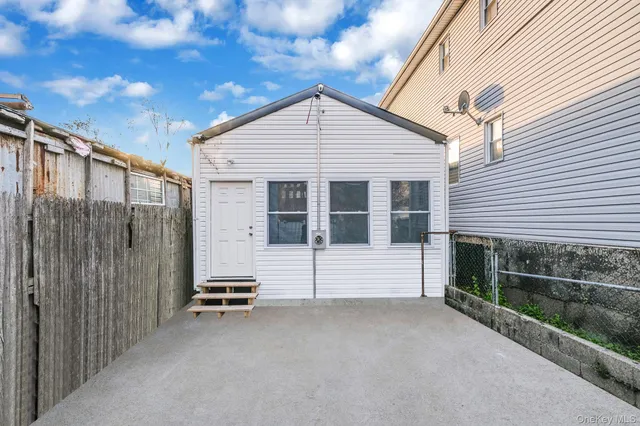 a view of a house with a large window