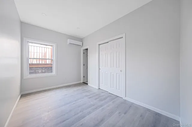 a kitchen with stainless steel appliances a refrigerator and a stove top oven