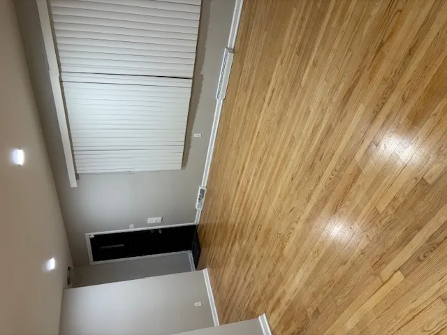 a view of room with a ceiling fan