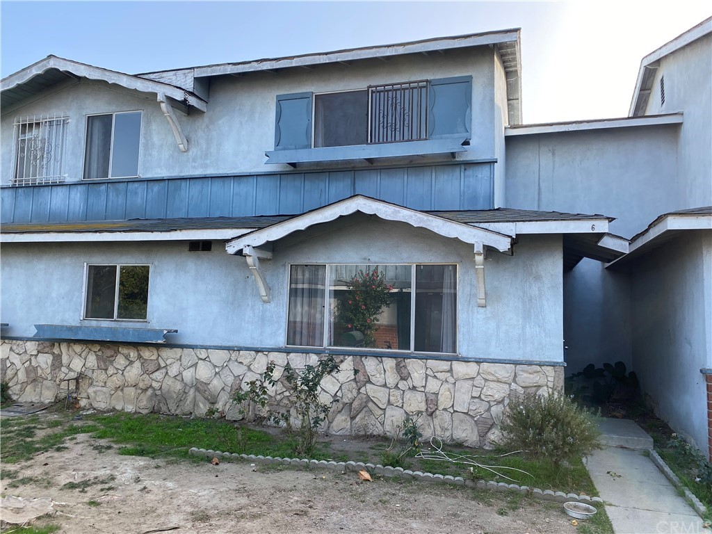 6 Millward Lane Carson, CA 90745 - Photo 1 of 1 a front view of a house with a yard
