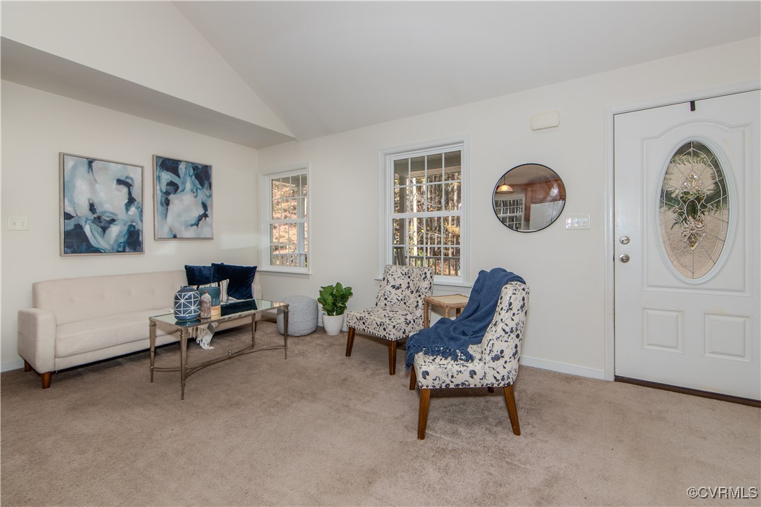 9595 Holdsworth Road Disputanta, VA 23842 - Photo 6 of 28 a living room with furniture and a window