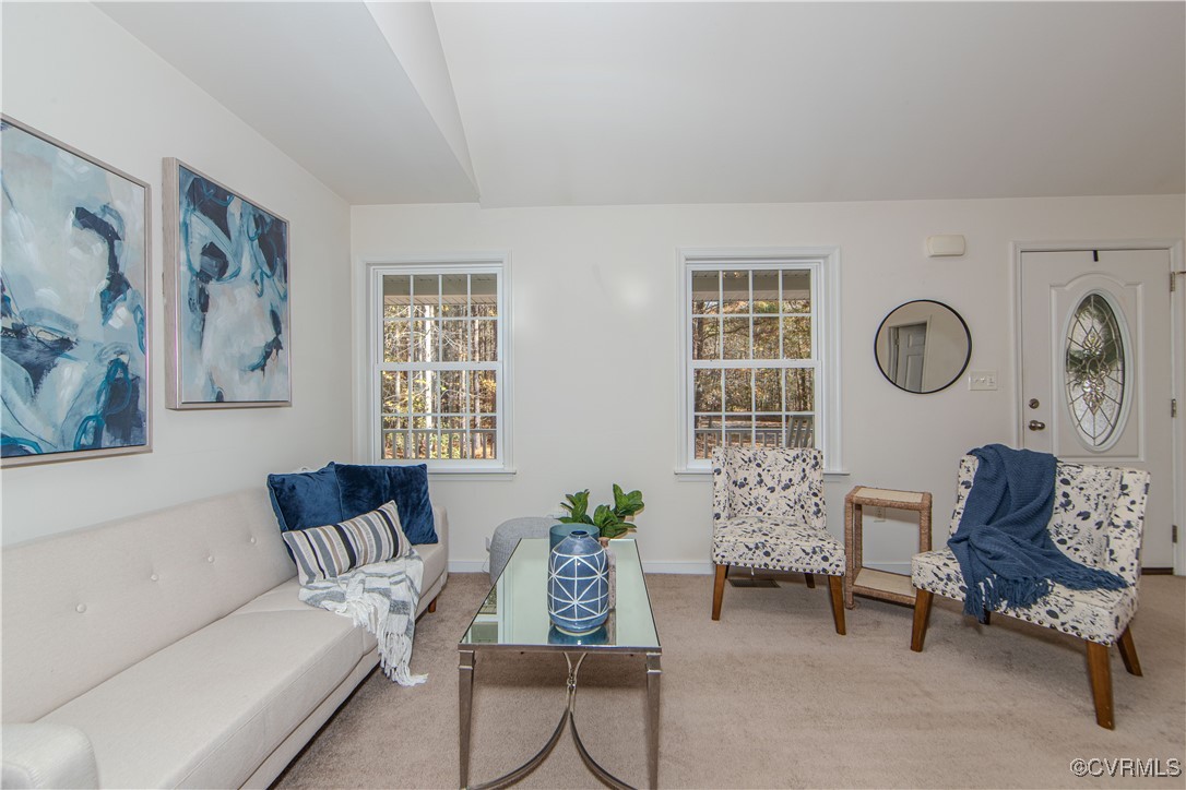 9595 Holdsworth Road Disputanta, VA 23842 - Photo 7 of 28 a living room with furniture and a window
