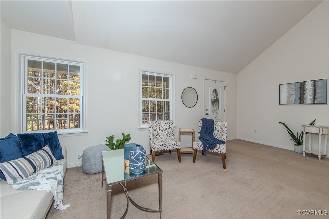 9595 Holdsworth Road Disputanta, VA 23842 - Photo 8 of 28 a living room with furniture and a window