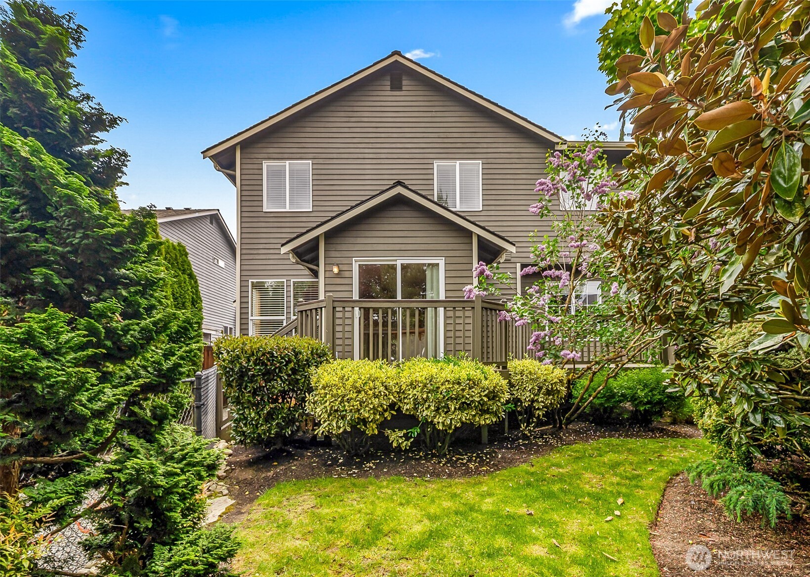 18410 11th Drive Southeast Bothell, WA 98012 - Photo 39 of 40 a view of a big house with garden
