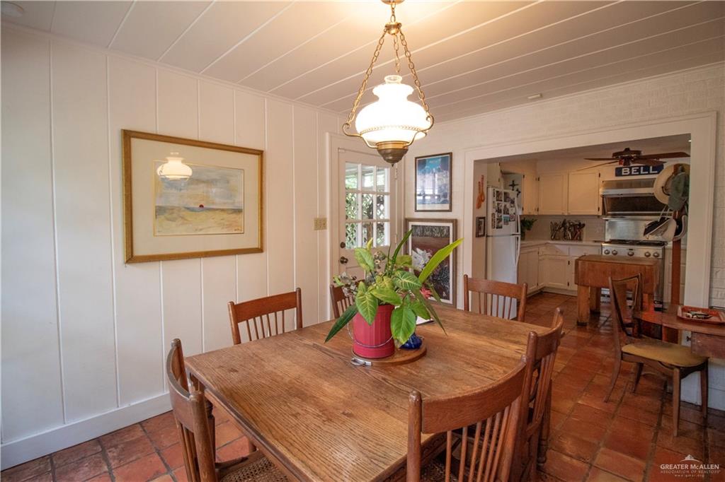 801 South River Road Donna, TX 78537 - Photo 11 of 35 a view of a dining room with furniture window and wooden floor