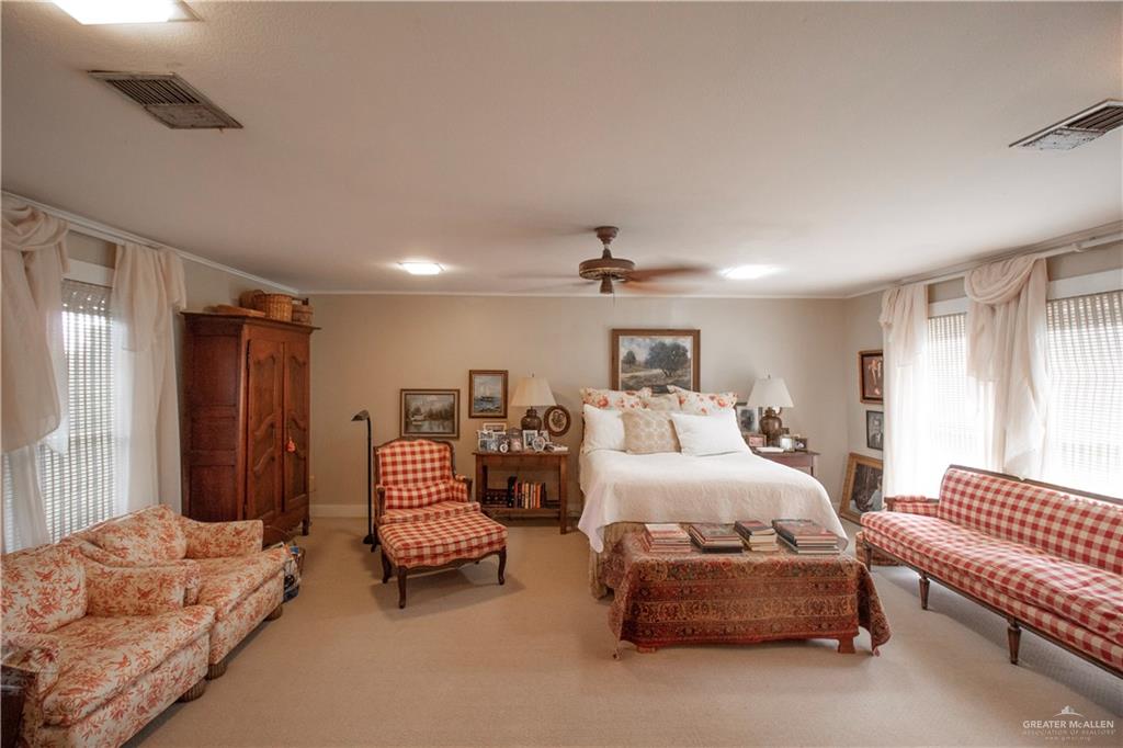 801 South River Road Donna, TX 78537 - Photo 14 of 35 a bedroom with bed and window