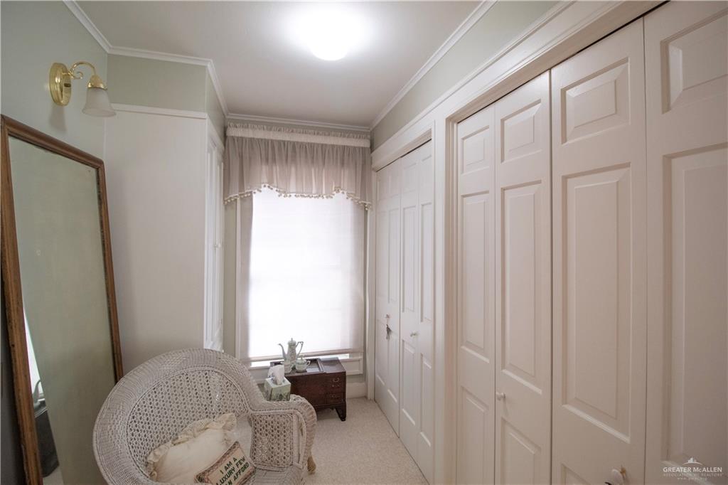 801 South River Road Donna, TX 78537 - Photo 20 of 35 a living room with furniture a window and a wooden floor