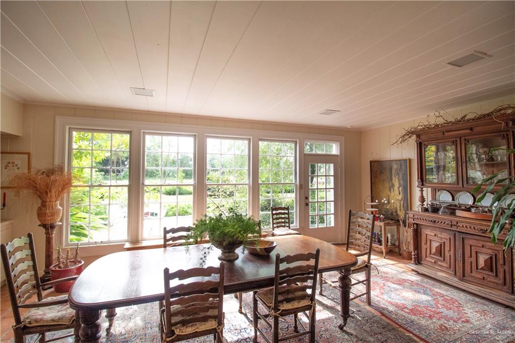 801 South River Road Donna, TX 78537 - Photo 7 of 35 a view of a dining room with furniture window and outside view
