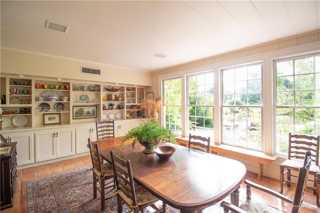 801 South River Road Donna, TX 78537 - Photo 8 of 35 a dining room with furniture window and wooden floor