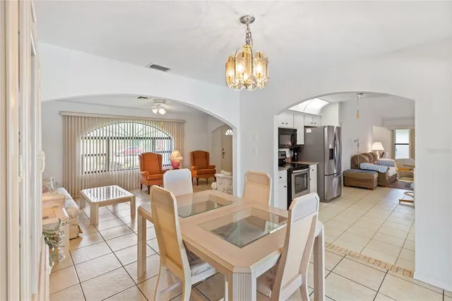 a view of a dining room with furniture