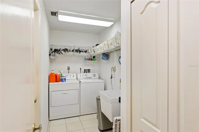 a storage room with dryer and washer