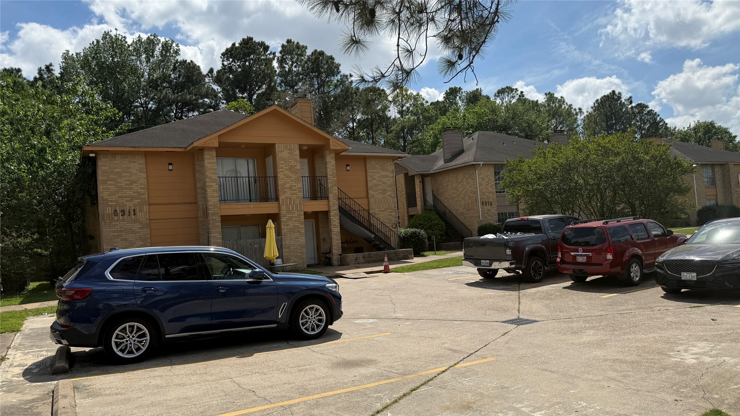 6307 West Gulf Bank Road, Unit 16 Houston, TX 77088 - Photo 3 of 9 a car parked in front of a house