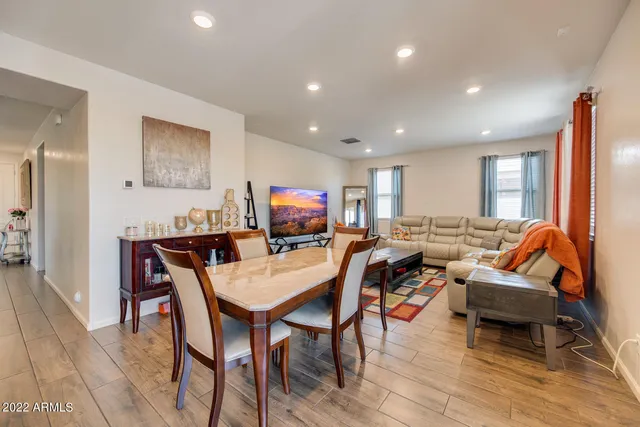 a view of a dining room with furniture