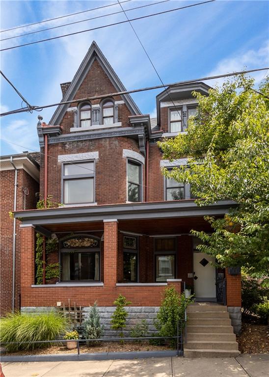 243 Fisk Street Pittsburgh, PA 15201 - Photo 2 of 34 a front view of a house with garden