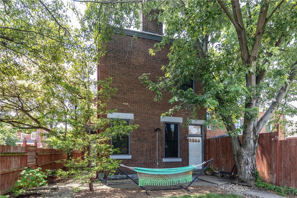 243 Fisk Street Pittsburgh, PA 15201 - Photo 32 of 34 a front view of a house with garden