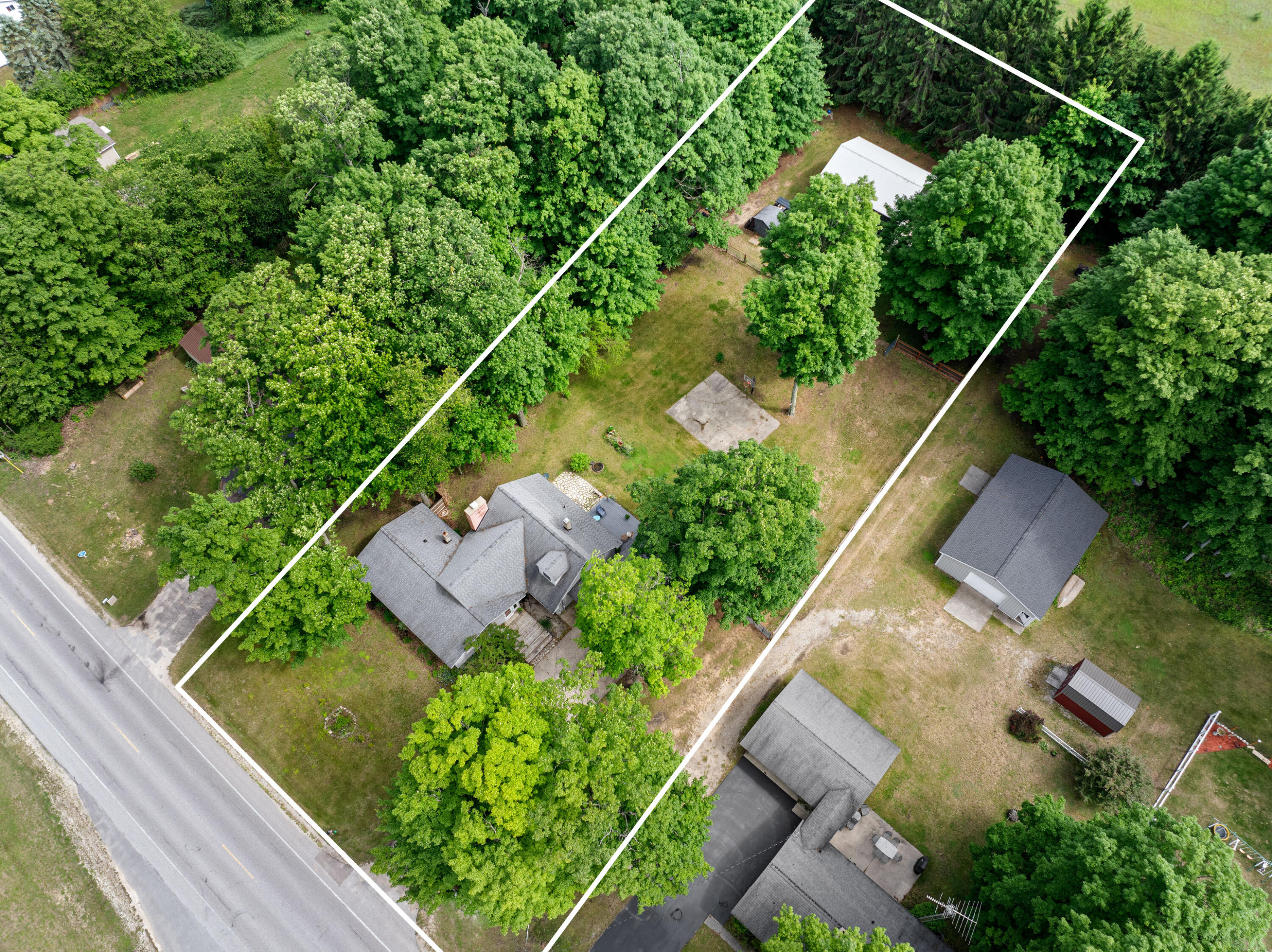 9055 Homestead Road Benzonia, MI 49616 - Photo 53 of 60 DJI_20260618161217_0210_D