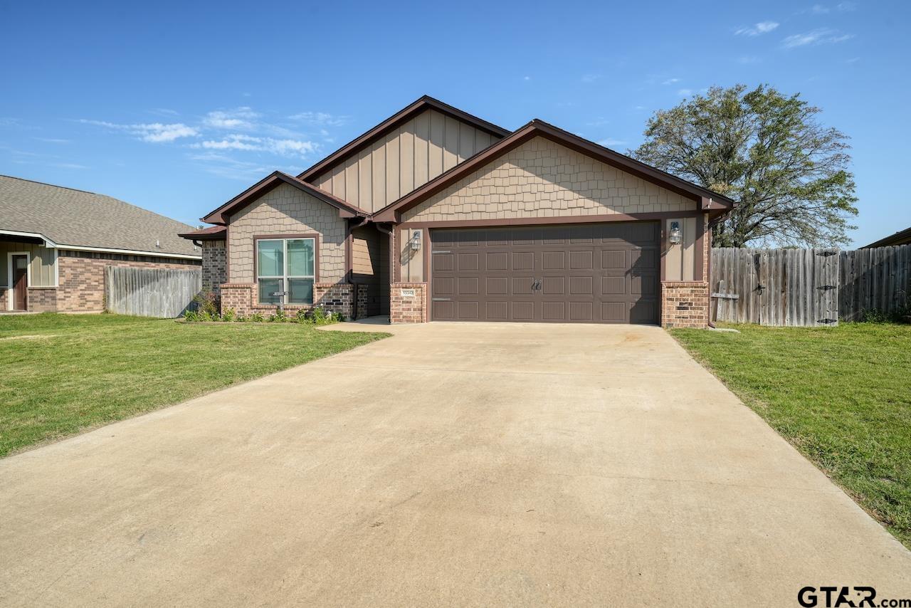 15342 Spring Oaks Drive Lindale, TX 75771 - Photo 2 of 45 a front view of house with yard and green space