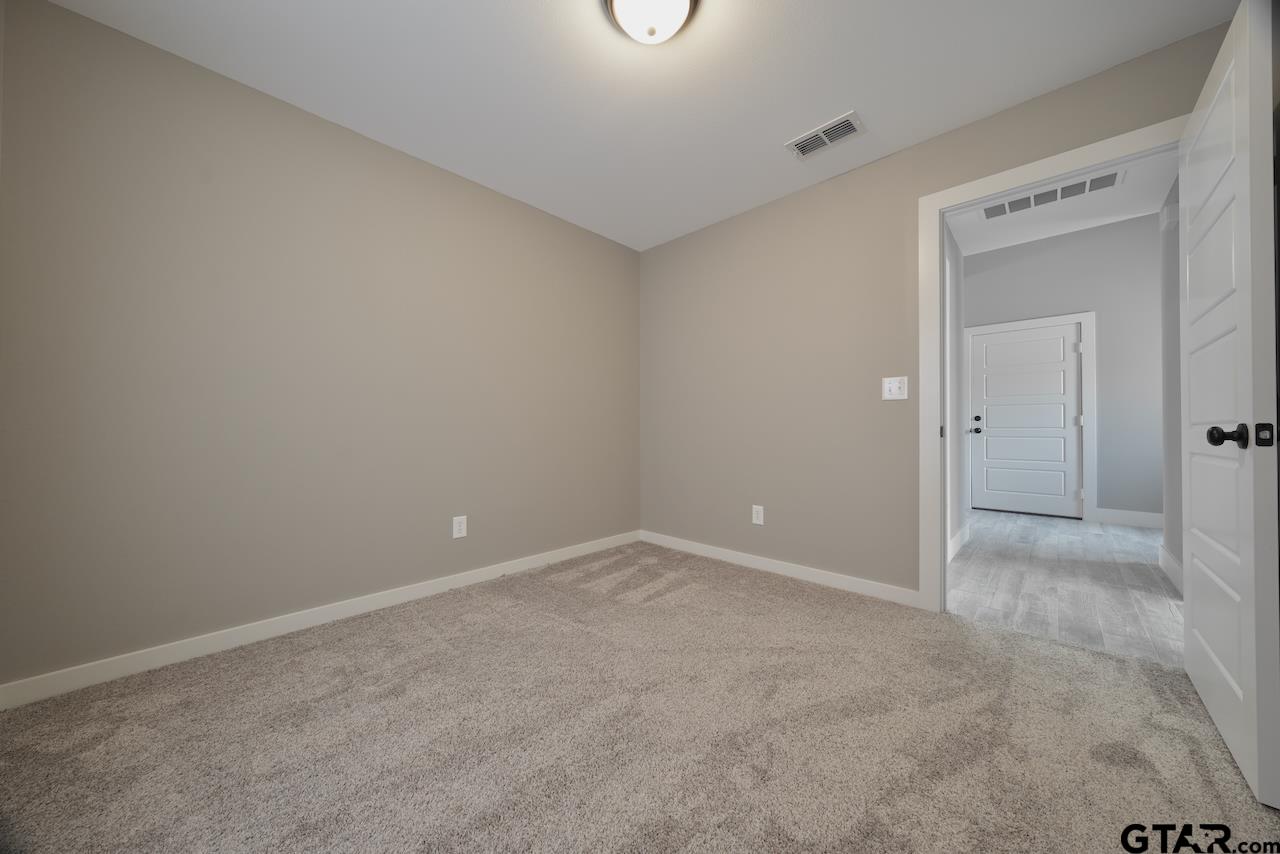 15342 Spring Oaks Drive Lindale, TX 75771 - Photo 39 of 45 a view of an empty room with glass door
