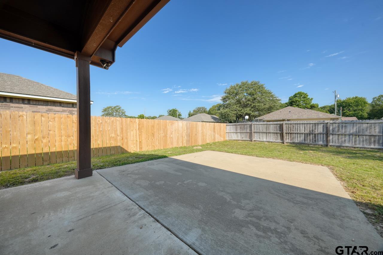 15342 Spring Oaks Drive Lindale, TX 75771 - Photo 40 of 45 a view of a swimming pool with a yard