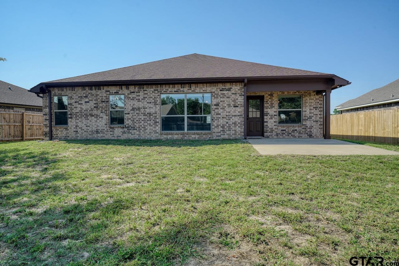 15342 Spring Oaks Drive Lindale, TX 75771 - Photo 43 of 45 a front view of a house with garden