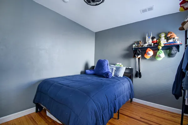 a view of a livingroom with wooden floor