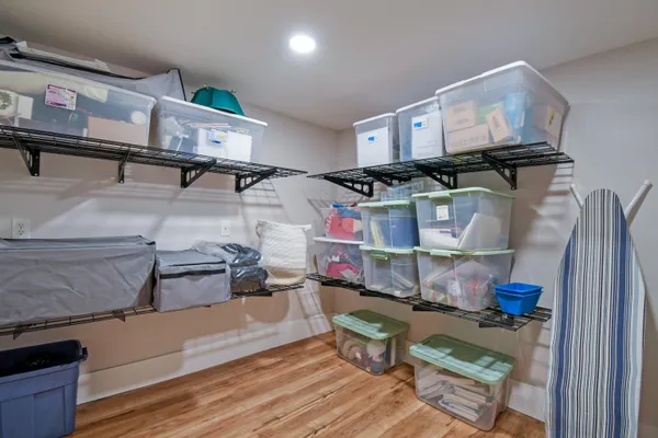 a utility room with dryer washer and sink