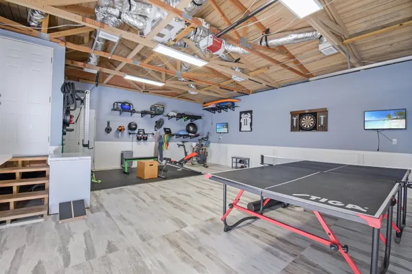 a view of a chairs and table in a room