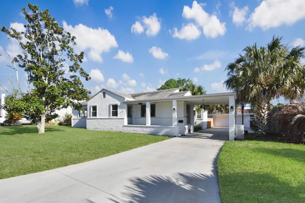 a car parked in front of a house