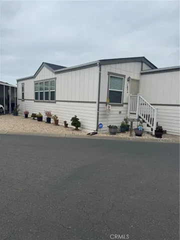 a front view of a house with street