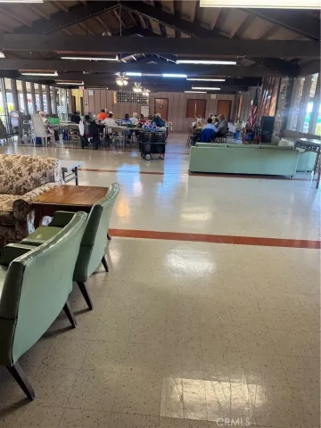 a living room filled with lots of furniture