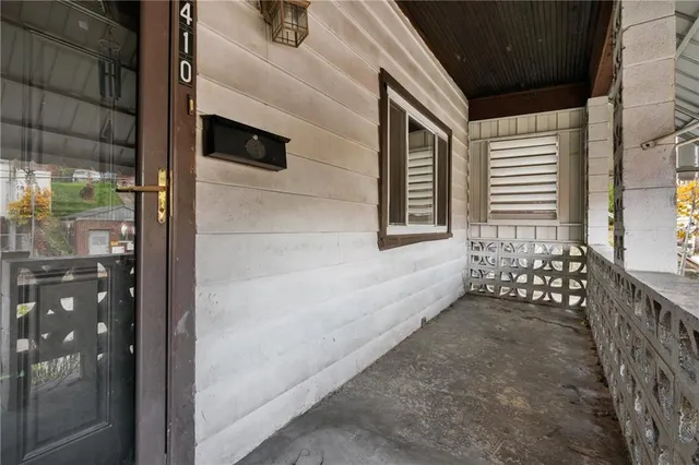 a balcony view with a outdoor seating space