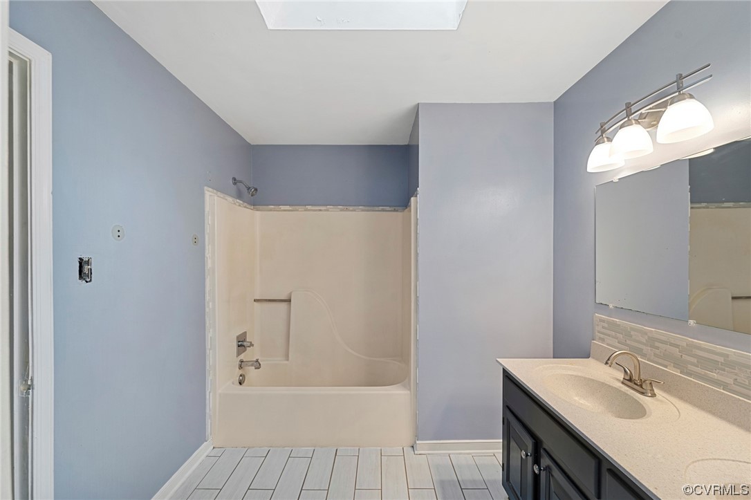 12031 Bundle Road Chesterfield, VA 23838 - Photo 25 of 43 a bathroom with a sink a toilet and shower