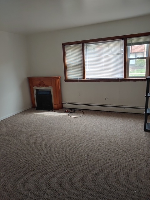 14613 Keystone Avenue Midlothian, IL 60445 - Photo 7 of 16 a view of an empty room with a window