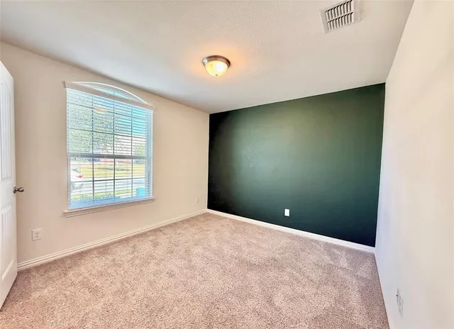 a view of empty room with window