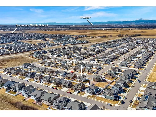 a view of a city with an ocean