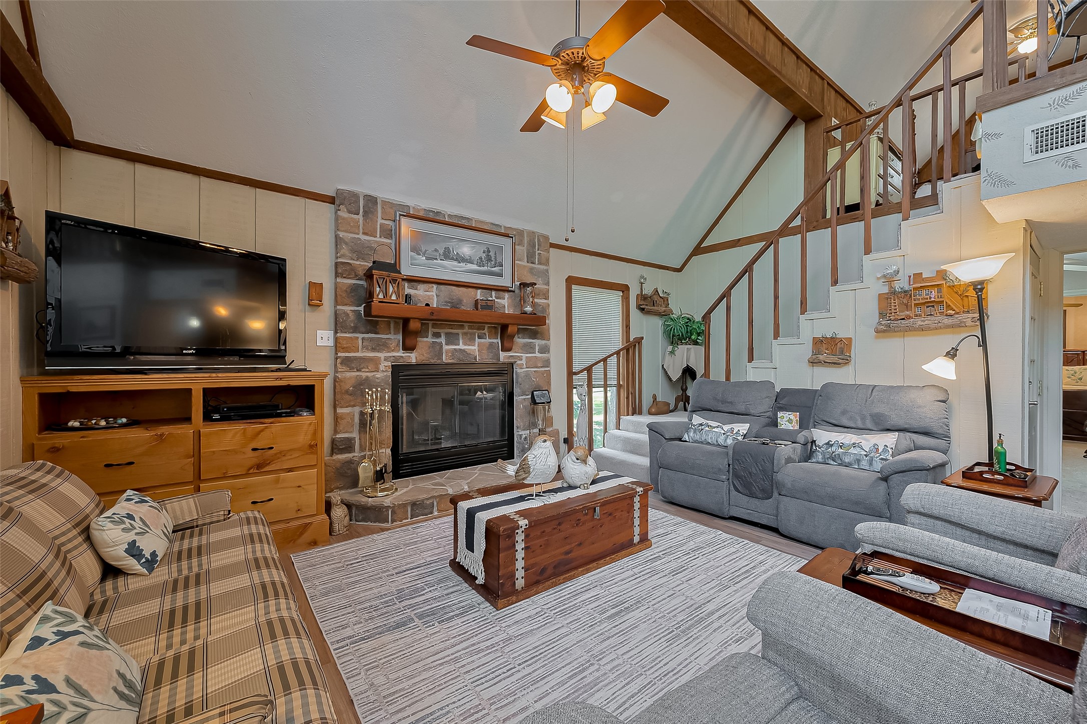 780 Hickory Ridge Drive Coldspring, TX 77331 - Photo 14 of 50 a living room with furniture and a flat screen tv