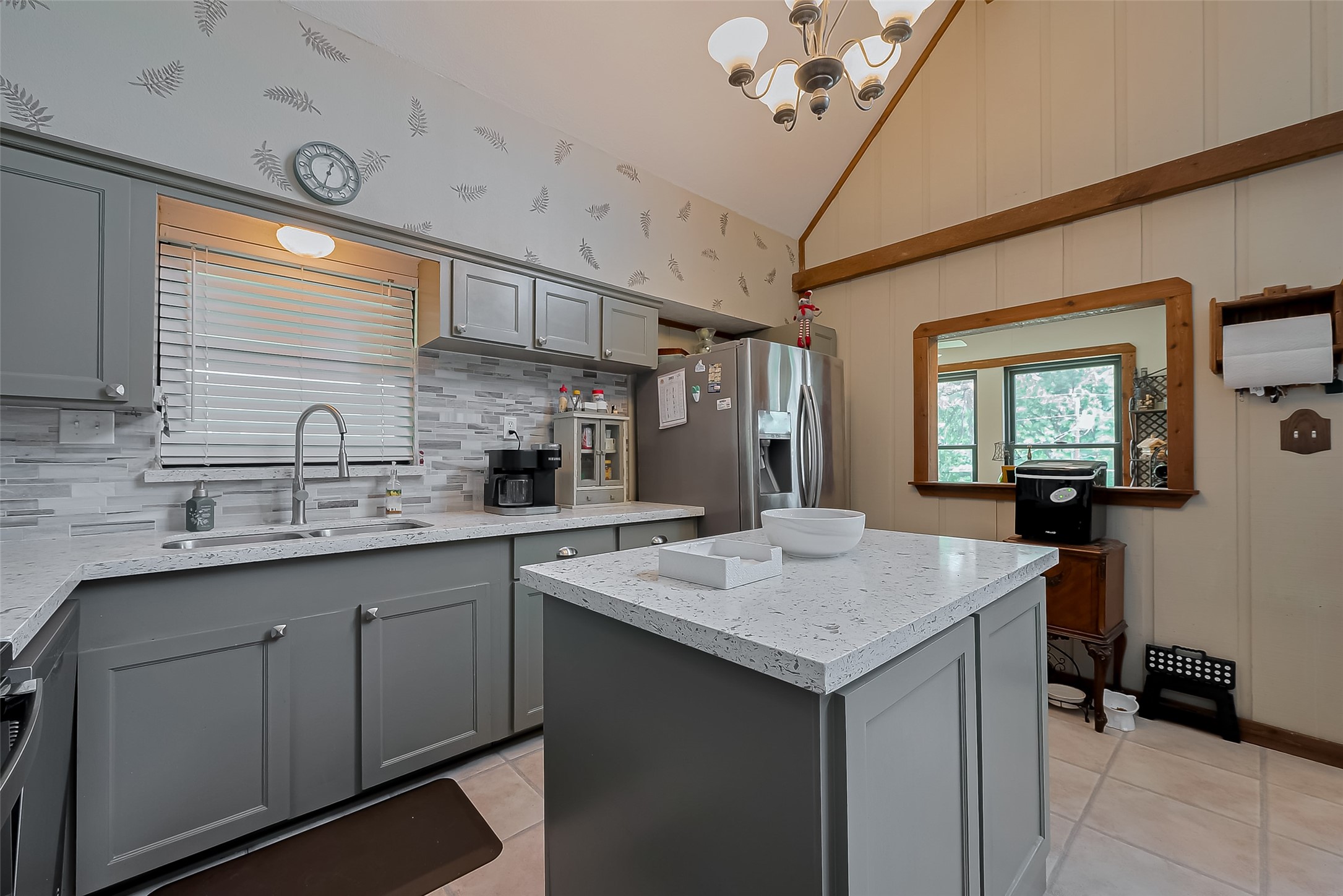 780 Hickory Ridge Drive Coldspring, TX 77331 - Photo 18 of 50 a kitchen with a sink a counter space and cabinets
