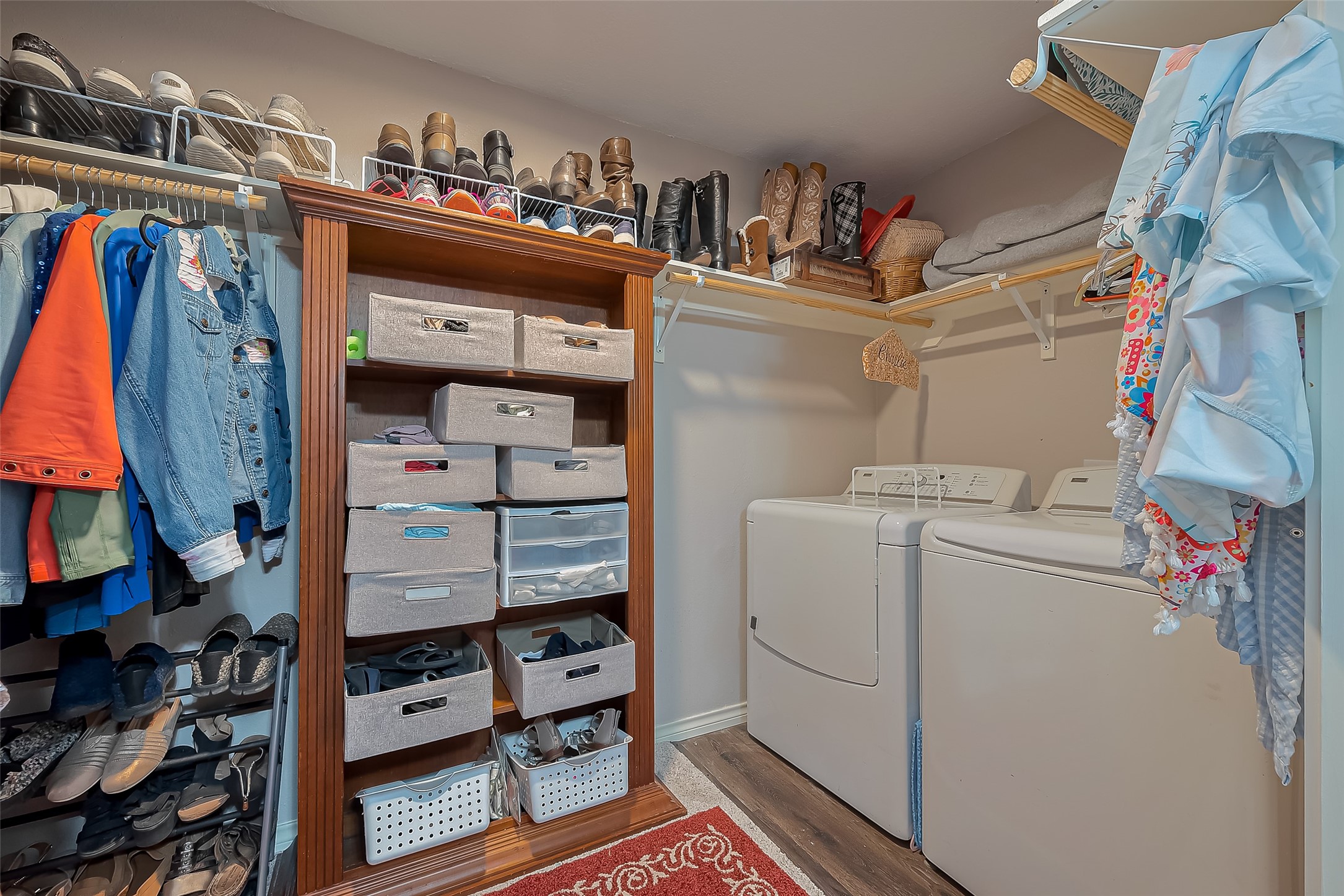 780 Hickory Ridge Drive Coldspring, TX 77331 - Photo 24 of 50 a view of walk in closet with clothes and shoes