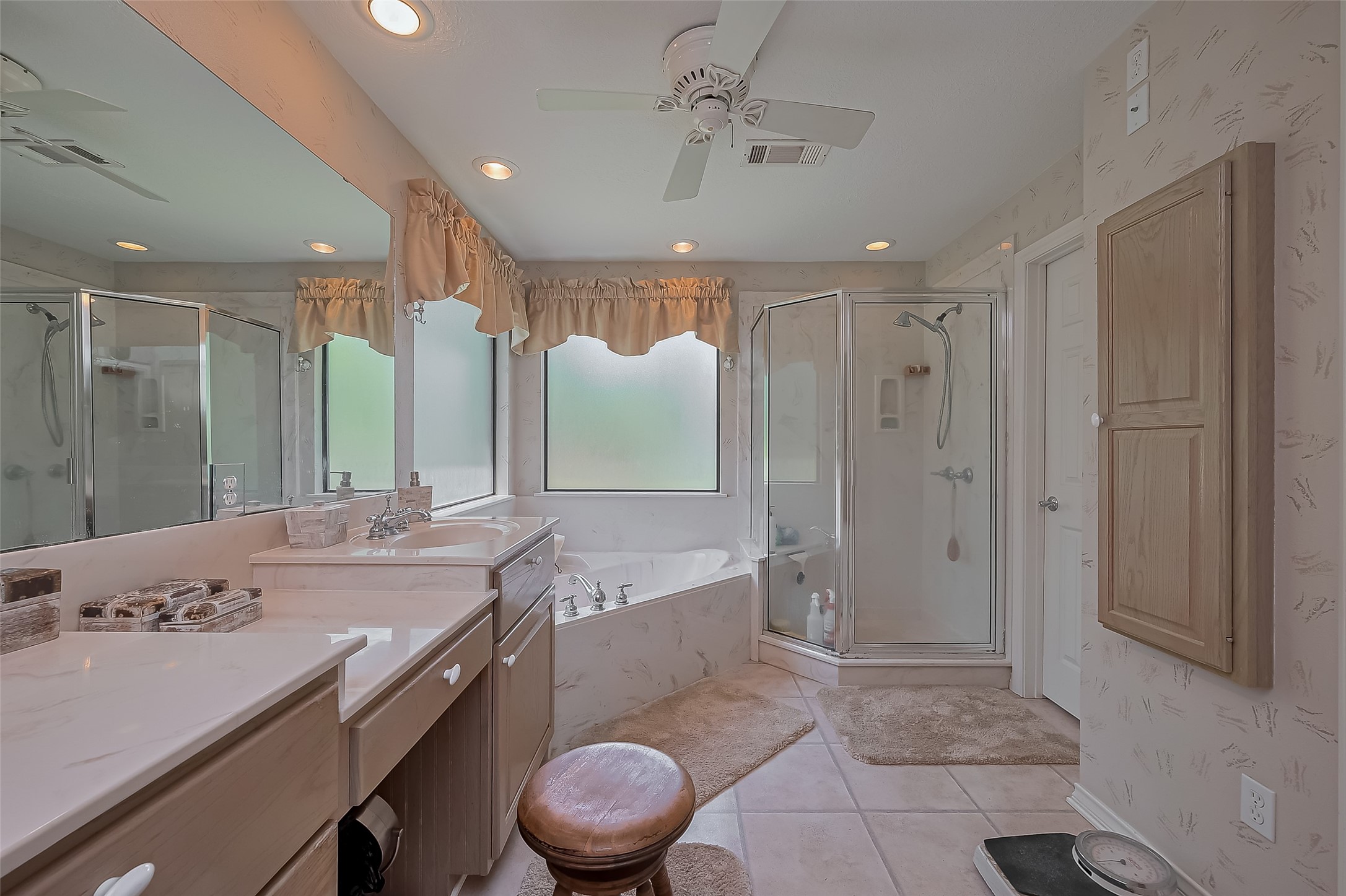 780 Hickory Ridge Drive Coldspring, TX 77331 - Photo 37 of 50 a bathroom with a granite countertop sink a toilet a mirror and shower