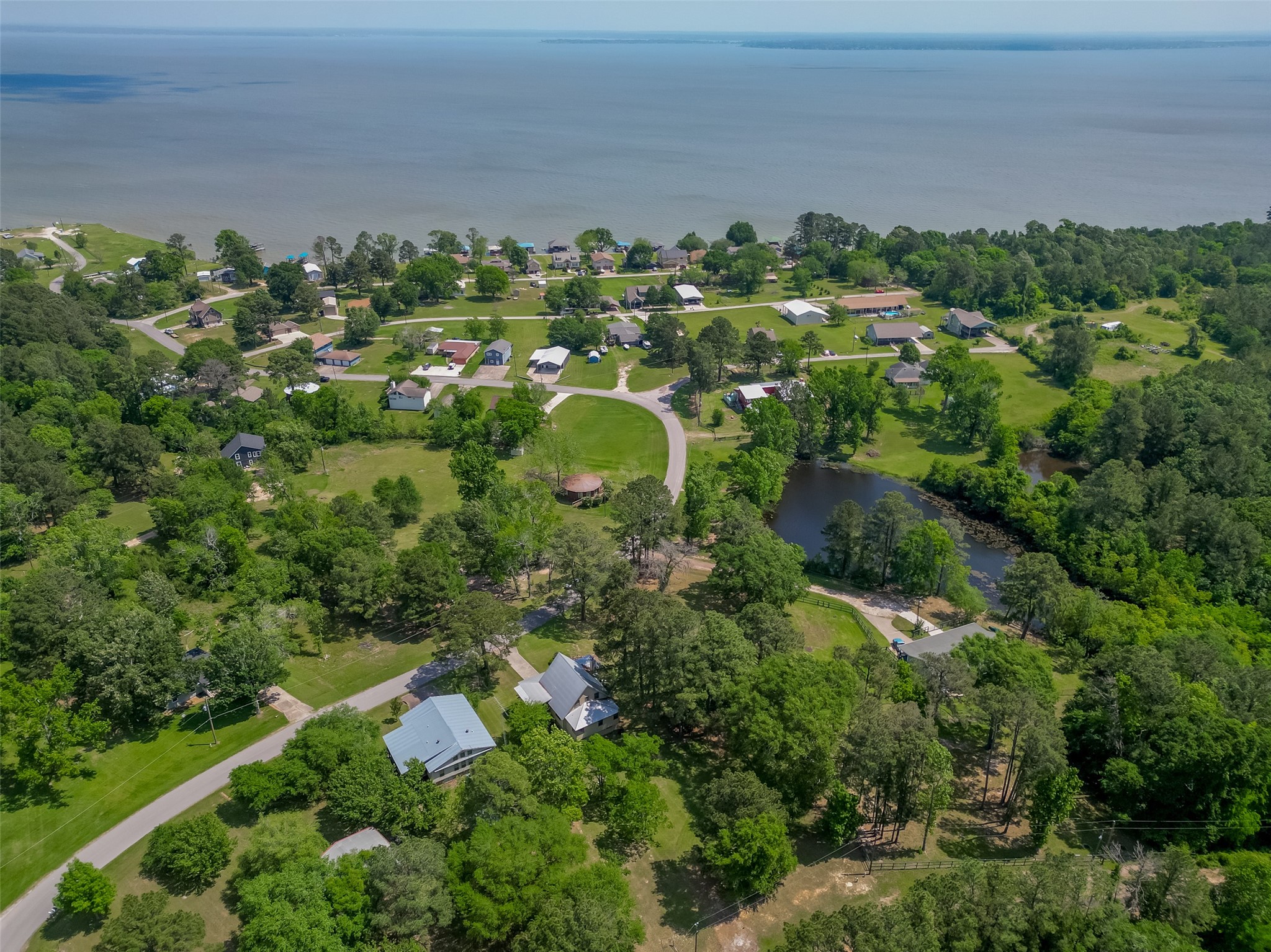 780 Hickory Ridge Drive Coldspring, TX 77331 - Photo 48 of 50 an aerial view of a house with a yard